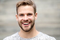 closeup of young man smiling