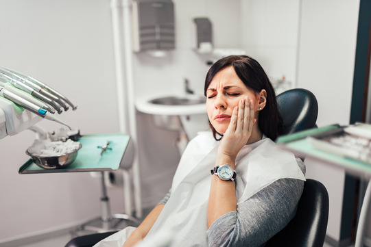 patient experiencing facial pain 